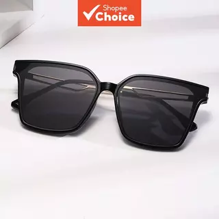 Óculos de sol feminino oversized com armação quadrada, lentes polarizadas e proteção UV400. Hastes de metal vazadas.