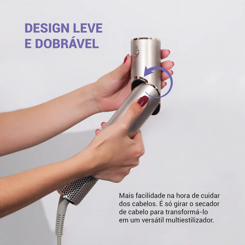 Mãos segurando e girando o cabo do secador Philco demonstrando o design dobrável e portátil