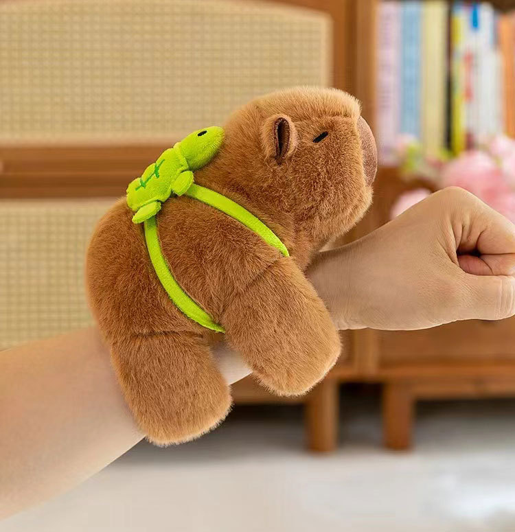 Imagem do produto Pulseira de pelúcia de capivara, brinquedo de capivara e mochila de tartaruga. 1