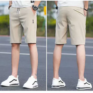 2024 Summer Men's Ice Silk Cinco Pontos de Seda de Verão Calças Elásticas Elásticas de Secagem Rápida Slim