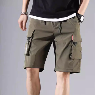 Summer Ice Silk Multi-pocket Shorts de seda de bolso solto Calças casuais confortáveis de cinco pontos Homens Mulheres podem usar verde