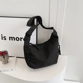 Saco de lona de grande capacidade Saco de lona feminino 2024 Novo Estilo Casual Saco de ombro leve para todos os tipos de viagem Saco de ombro leve para esportes Diagonal