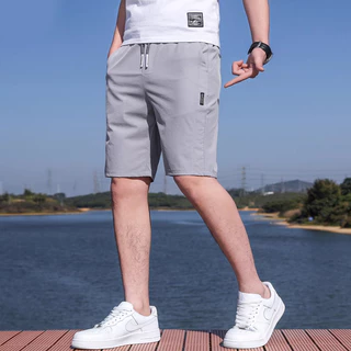 Calções de Verão Seda de Gelo Soltos Calças Casuais de Cinco Pontos Confortáveis Calças Casuais Homens Mulheres Podem Usar Cinza Claro