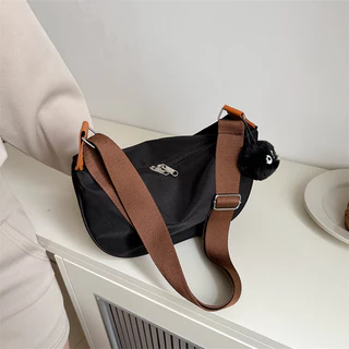Saco de lona de um ombro para mulheres 2024 Novo Estilo Saco de lona de grande capacidade Saco de um ombro para o braço Casual Cross-Body Dump