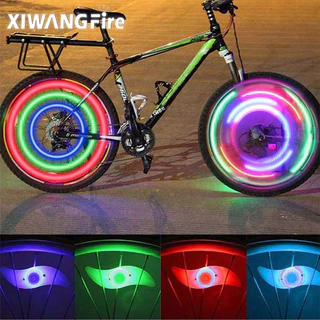 Xiwangfire Luzes de Bicicleta Noturna com Bateria de Botão e Luz Colorida