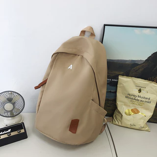 Mochila simples de grande capacidade em cor contrastante da moda adequada para faculdade