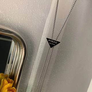 1 High-End sentimento pulável prata triângulo borla colar feminino luz luxo nicho Design elegante All-Match Cla