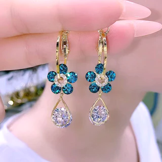Brincos femininos 1 par nicho temperamento incrustado zircão flor azul luz brincos de liga de luxo