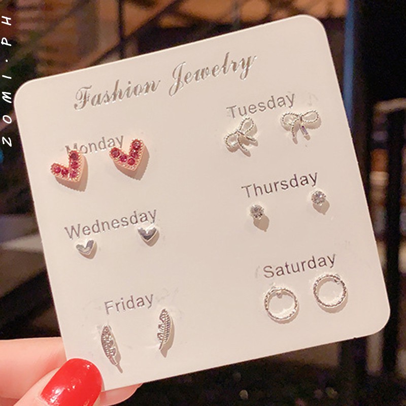 Versão coreana Brincos de venda a quente Brincos de venda a quente Preservação da cor Brincos de agulha de aço Estilo criativo Uma semana Brincos Jóias Venda por atacado