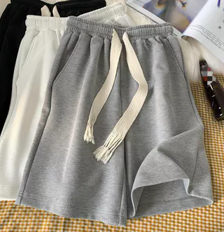 Waffle Shorts masculino verão calças cortadas soltas ins versão coreana All-Match calças de praia exterior Wear casal es